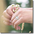 diamond engagement ring worn on the hand of a woman